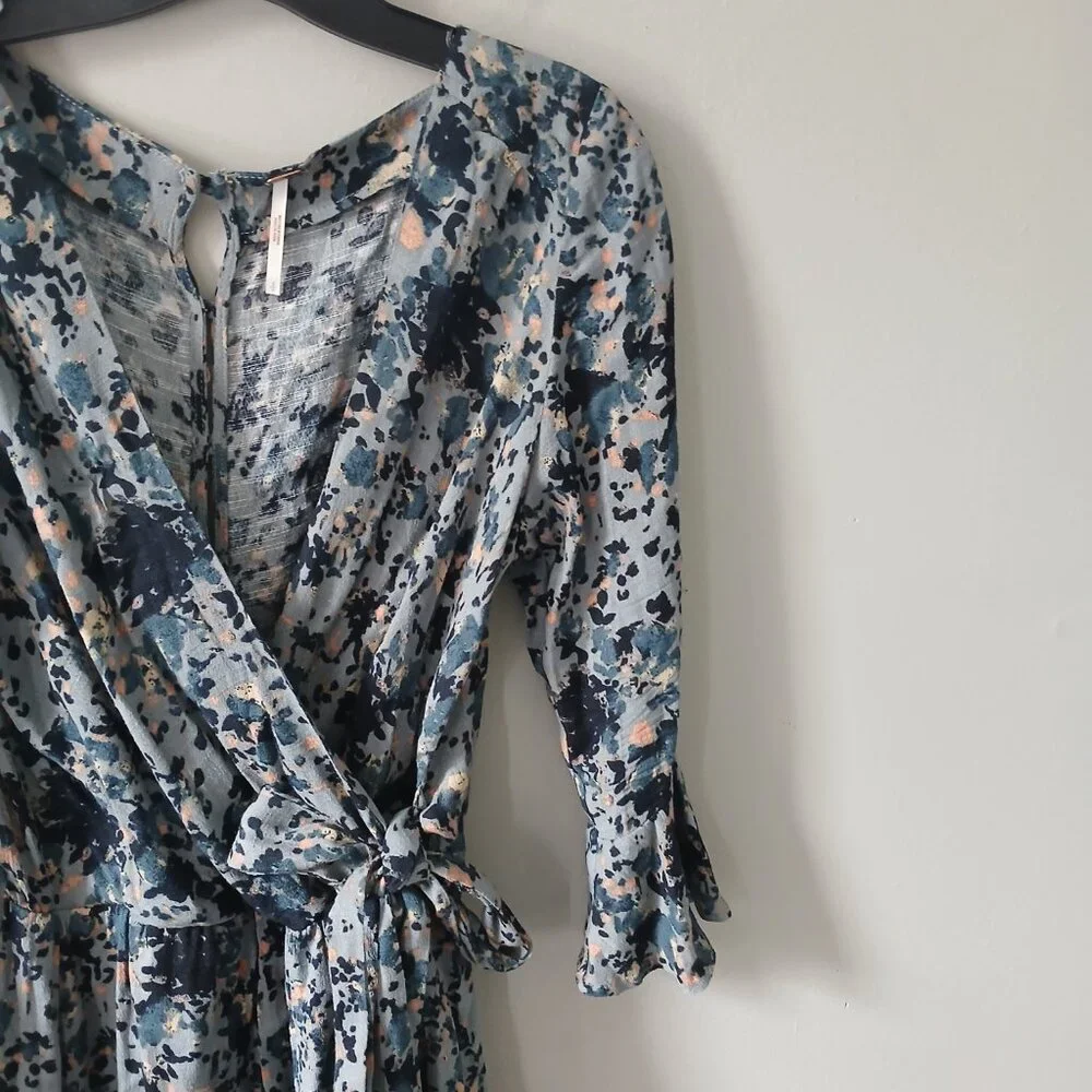Free People Size S All the Right Ruffles Blue Floral Romper Flutter Sleeve Vneck